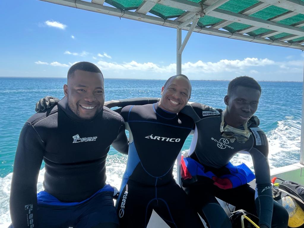 Cezar Mahumane, Julio Cesar Marins, and Madick Gueye in Mozambique, 2023. (Photo by Steve Lubkemann)