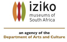 Iziko Museums of South Africa: an agency of the Department of Arts and Culture logo. The logo has three shapes on the upper left, in orange, red, and green, that look like an African shield in shape. "iziko museums of South Africa" is in black font. Below that is a tan bar, and below the bar the logo says "an agency of the" in black font and "Department of Arts in Culture" in tan.